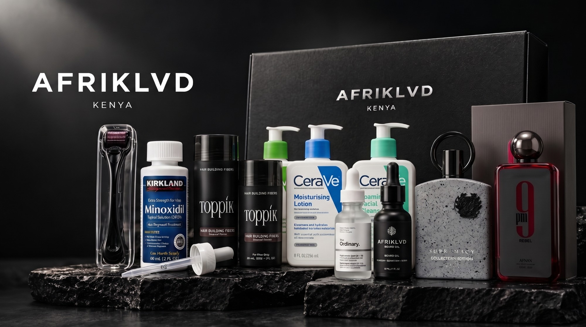Afriklad Kenya grooming range on black stone: beard oil, hair fibres, minoxidil, skincare, fragrance and the Afriklad gift box